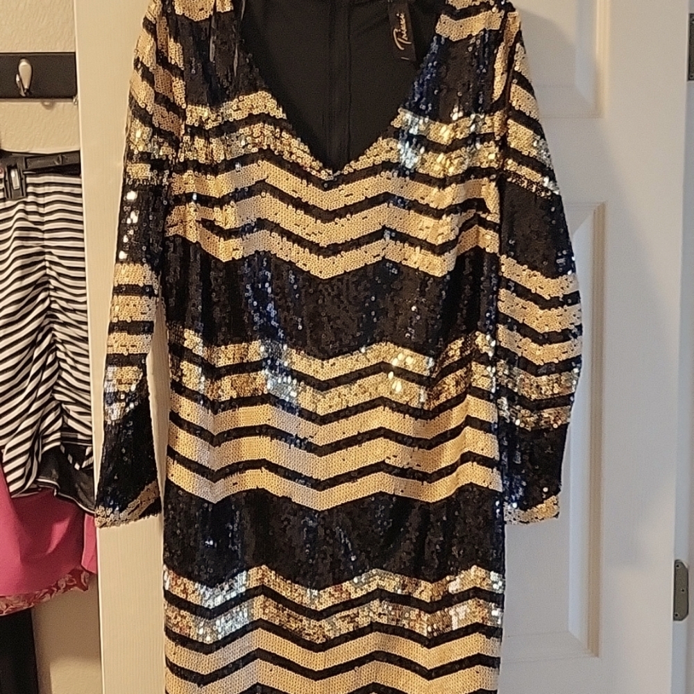 Dress . Great for a night wedding or a night out on the town. Beaded and sparkly
